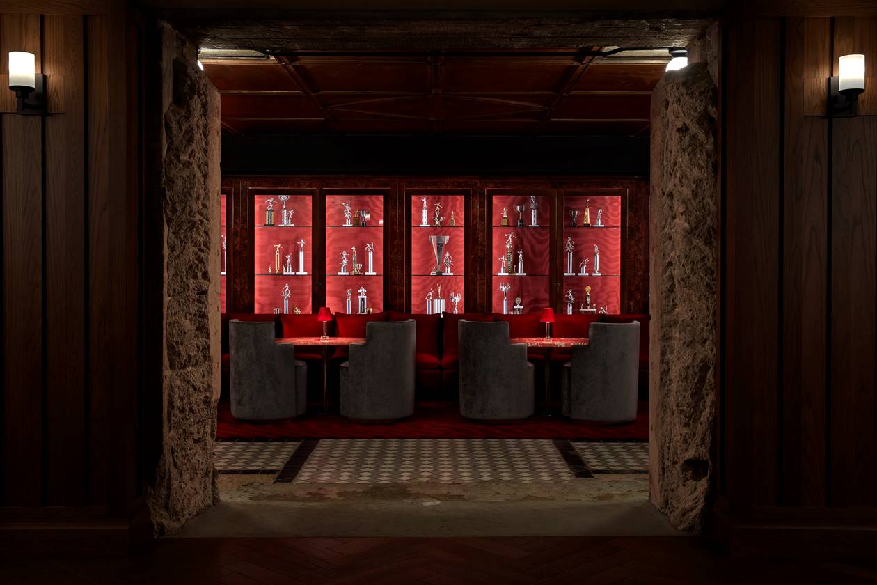 The Silver Lyan bar, highlighting the sophisticated design, ambient lighting and a display window with various prizes.